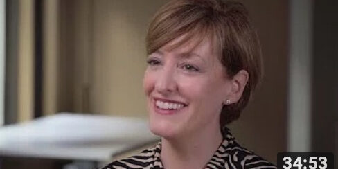 Caitlin smiling during an interview